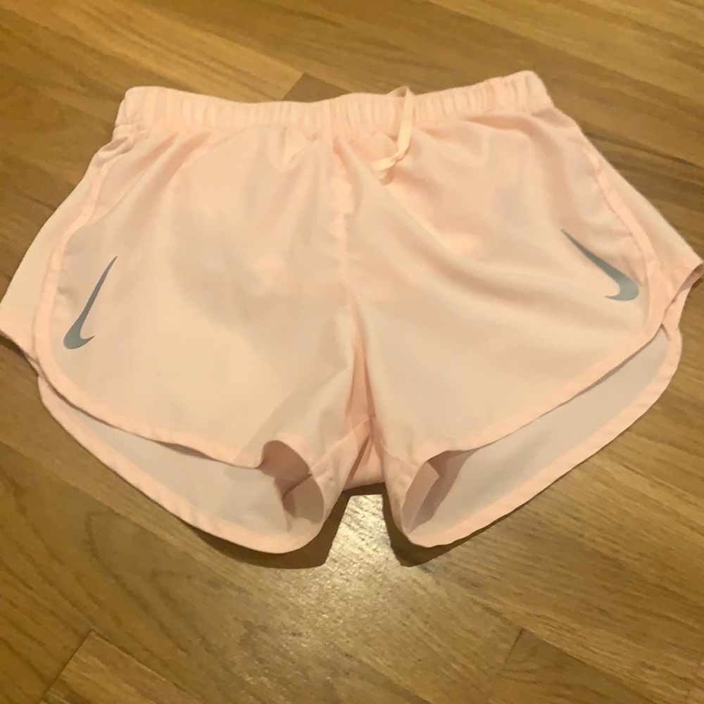 pink Nike athletic shorts